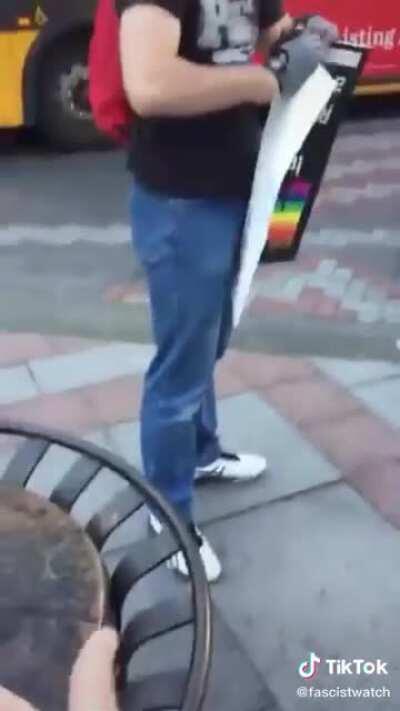 Proud Boy attempts to destroy Pride Sign