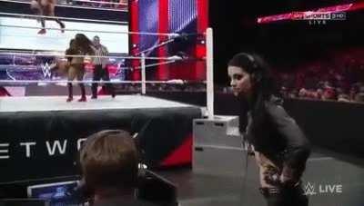 AJ Lee ragdolled by Nikki Bella