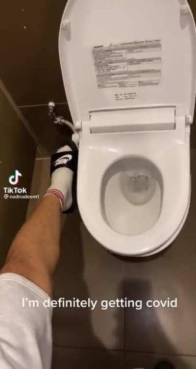To flush a toilet