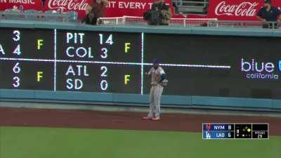 [Highlight] [Highlight] James Outman hits a ball between the outfield wall and its padding.