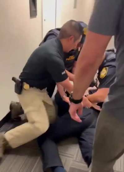 United States senator, Alex Padilla, being forced into handcuffs by collaborators of fascism