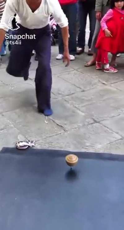 Wise old man uses black magic to entertain a crowd