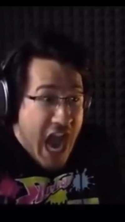 The dude behind the funny