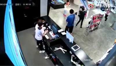 A kid hit the mirror with a basketball resulted in getting himself smashed by the mirror