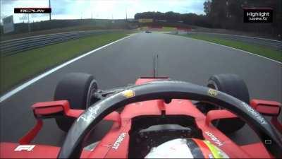 Sainz reacts in the garage to on-screen action