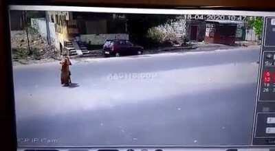 Allow me to help you cross the street madame