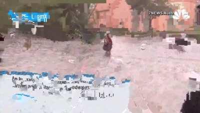 Camera man helps out family struggling in hurricane.