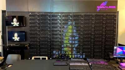 We used almost 100 RGB keyboards to build a giant display. Yes, we played Bad Apple and Rick Roll.