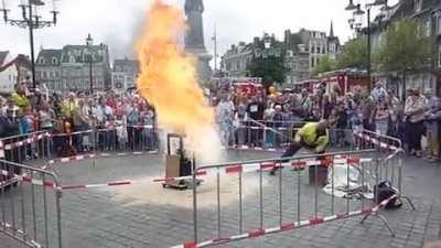 Firefighter shows what happens if you use water to put out a grease fire