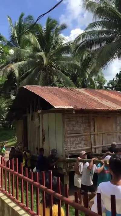 Philippine villagers relocate a widower’s home so he could live closer to family. The journey took 2 hours