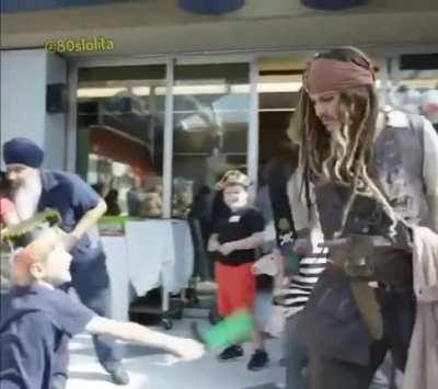 Johnny Depp visits children's hospital dressed as Captain Jack Sparrow