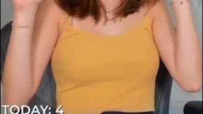 Chess Twitch Streamer / Youtube Vlogger Anna Cramling Accidently Pushing Her Clothed Boobs Together Causing Her Boobs To Be Slightly Pushed Up Above Her Top And Then Hidden Again While Pretending To Ba A Cat Followed By Slo-Mo Followed By Slo-Mo With Boob