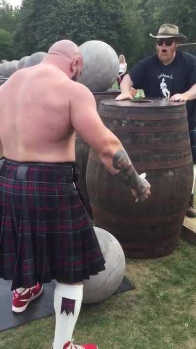 Andrew Cairney from Glasglow, Scotland loading all nine of The Ardblair Stones