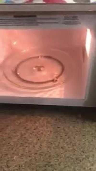 my microwave turns on when i open it