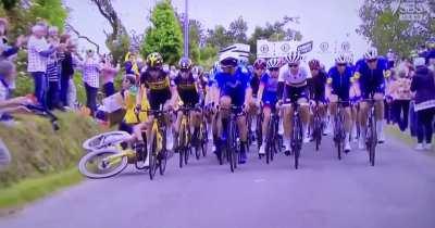 Holding a sign at the Tour de France
