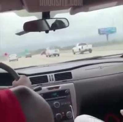 Idiot driver speeding and swerving through traffic eats airbag