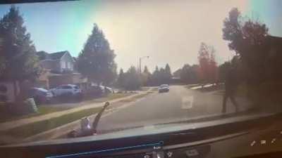 A man pushed his own child into a moving car to apparently 
