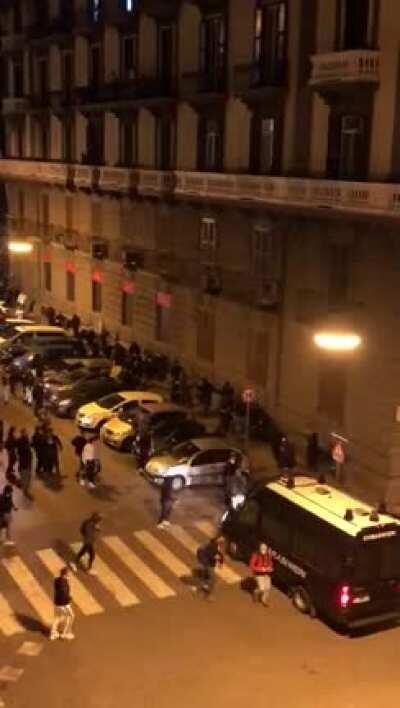 Naples, Italy. Protests for 11pm curfew turn violent with protesters assaulting police officers and causing damage all around the city