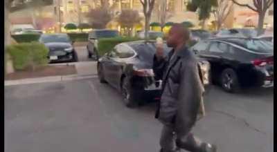 Ye eating ice cream and getting into a mini van today (1-20-2022)