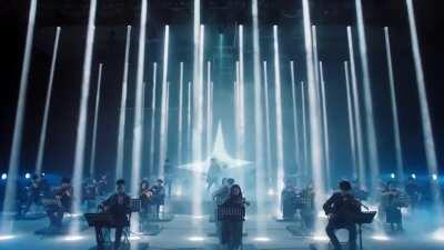 Riot Games China had recently collabed with Oppo to make a live orchestra of champion themes. They had performed a mashup of Pantheon's theme alongside The Climb.