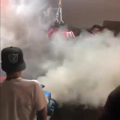 An ounce of weed, blowtorch, and an inflator for a bouncy castle... Check out the smiles on everyone!