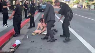 Peaceful protest results in peaceful protestor getting assaulted.