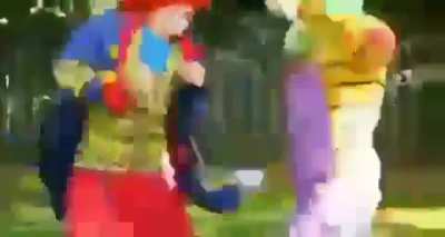 Two clowns fighting