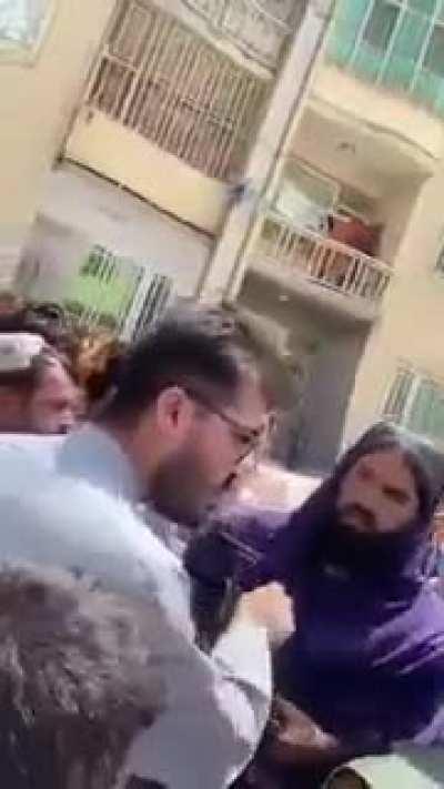 Taliban fighter tries to take a mans pickup and when he asks to speak to the Talibans Emir The Talib threatens him and says 