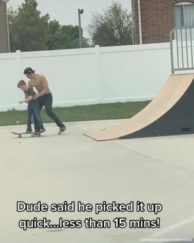 Big skater dude teaches little skater dude