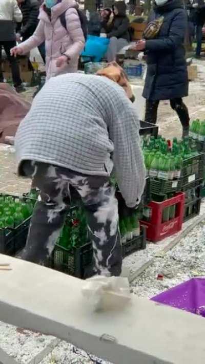 Ukranian people preparing to greet Russian soldiers