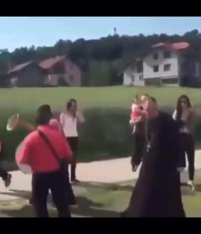 Serbian priest shows hospitality and respect to gypsy artists.