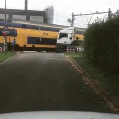 Man attempts to stop a moving train to save his truck