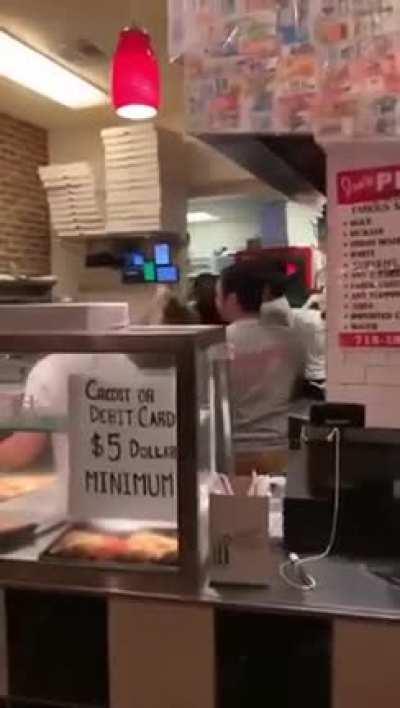 Minor disagreement at the pizza parlor