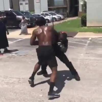 Cop spars guy on the street
