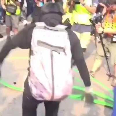 Protestors In Hong Kong Cutting Down Facial Recognition Towers.