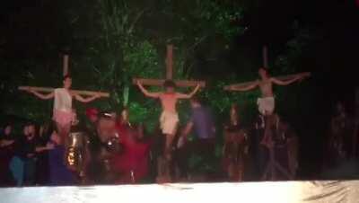 Audience member tries to save Jesus from crucifixion