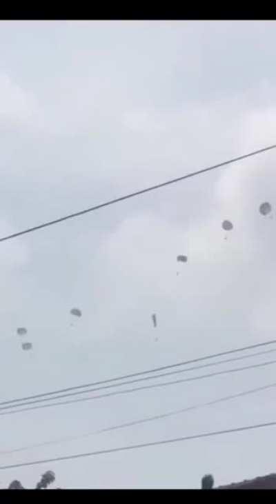 This is the moment an Indonesian paratrooper plunged 1,600ft when his parachute got tangled during a training exercise - but miraculously survived