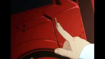 Lain looking at a little puppy