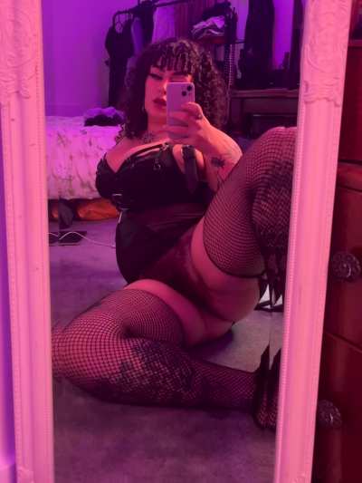 I love how my legs look in fishnet stockings 