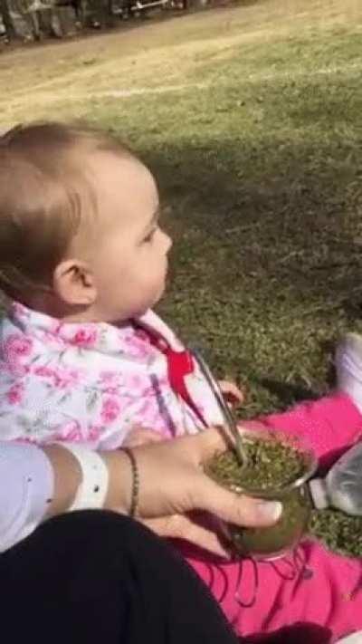 Baby's first time drinking tea