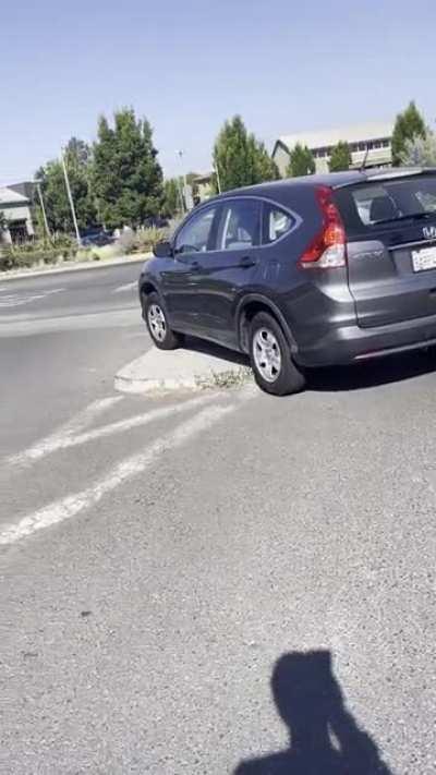 Eleventy year old backs up into my car and then gets himself stuck. Ongoing issue in my town, take their licenses away!