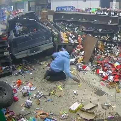 Drunk guy crashes into minimart and then tries to hide the evidence