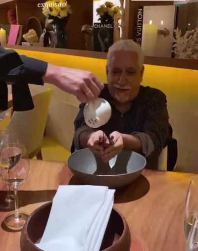 Poured melted chocolate ON HANDS