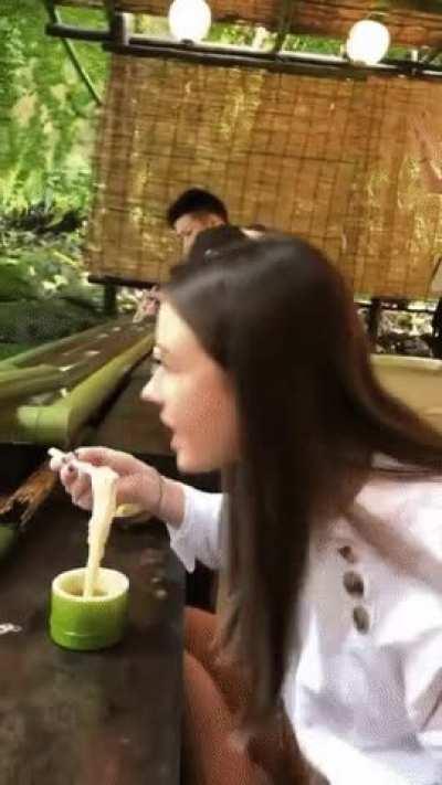 This is a special way of serving noodles in Japan and its called Nagashi Somen.