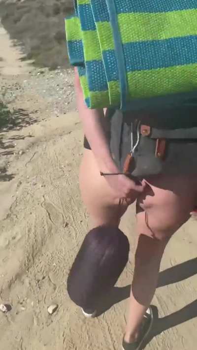 Letting everyone at the nude beach know what kind of wife I am 