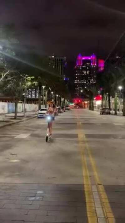 Keep an eye out for a girl with her tits out riding around town on a scooter😜 [GIF]