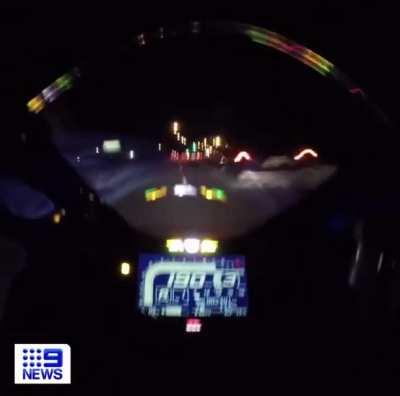 Bike rams back of vehicle