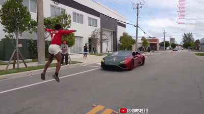 IShowSpeed jumps over 2 cars on livestream