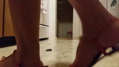 Flat sandals crushing snails and slug