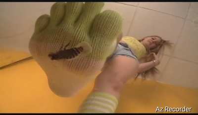 Natasha crushes cheap, wearing socks over the glass.